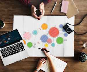 woman drawing colorful circles
